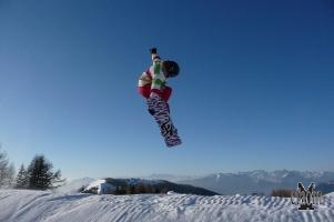 acrobazie sullo snowboard